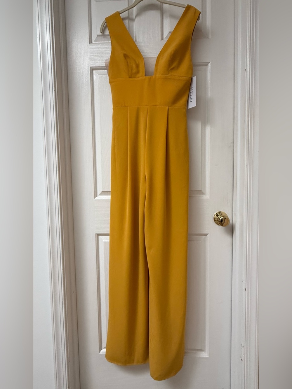 HELSI Zoe Deep V-Neck Wide-Leg Jumpsuit in a vibrant canary yellow - NWT